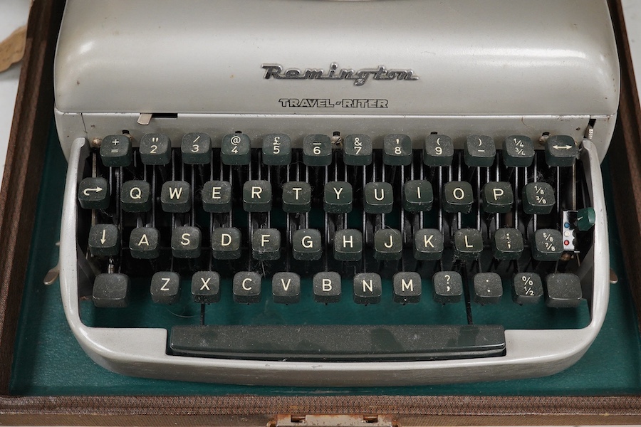 Three cased typewriters; a German Gossen Tippa, a Remington Travel-Riter and a German (U.S. Zone) Blue Bird. Condition - fair to good.